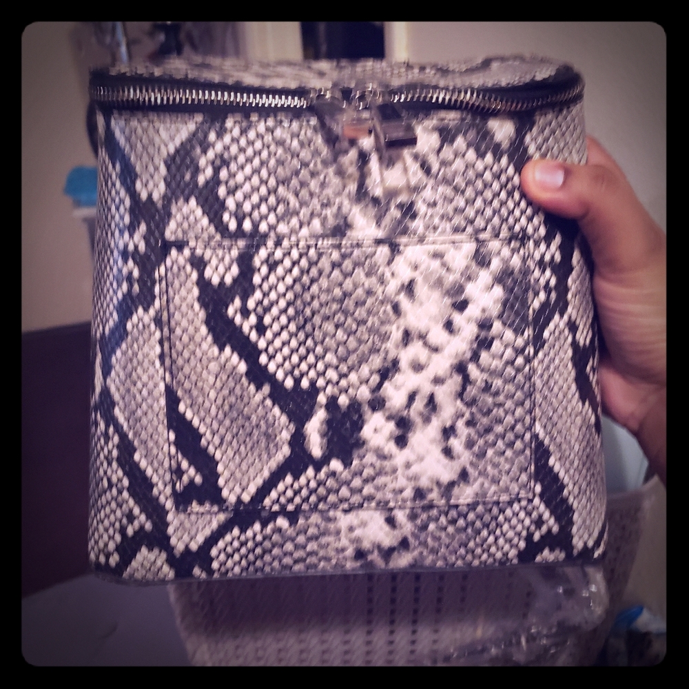 Aldo black and white snakeskin backpack/handbag